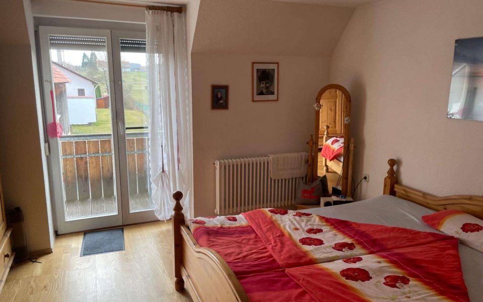 Schlafzimmer mit Balkon