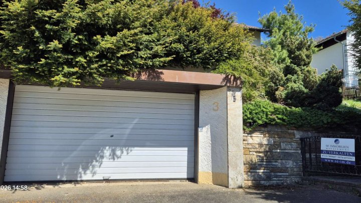Schönes Haus mit Traumaussicht, Einliegerwohnung, schönem Garten und Garage zu verkaufen!